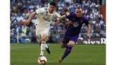 FOTO: Gairah Baru Real Madrid di Bawah Kendali Zidane Kembalinya Zinedine Zidane ke Santiago Bernabeu menghadirkan gairah baru dan sukses mengalahkan Celta Vigo 2-0 di La Liga berkat gol Isco dan Gareth Bale.