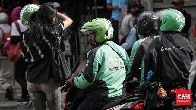 Aplikasi Grab dan Gojek Dibajak di Singapura