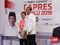 Gandeng Iriana, Jokowi Tiba di Lokasi Debat Keempat