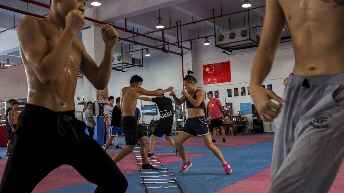 FOTO: Ibu Satu Anak Ratu Tinju Asia dari China