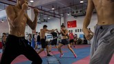 FOTO: Ibu Satu Anak Ratu Tinju Asia dari China Huang Wensi, ibu satu anak dinobatkan sebagai ratu tinju Asia usai menyabet sabuk juara kelas Terbang Super Asia dengan mengalahkan petinju Thailand.