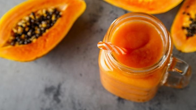 Papaya smoothie, selective focus. Detox, diet food, vegetarian food, healthy eating concept.