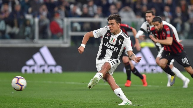 Juventus bangkit dari ketertinggalan pada babak pertama dan memastikan kemenangan 2-1 atas Milan di Stadion Allianz, Turin, Sabtu (6/4) waktu setempat.