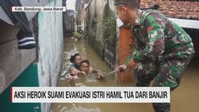 VIDEO: Aksi Heroik Suami Evakuasi Istri Hamil Tua dari Banjir
