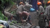 FOTO: Longsor di Rio de Janeiro Renggut Enam Nyawa Badai dan hujan deras memicu longsor di Rio de Janeiro, Brasil. Bencana itu merenggut enam nyawa penduduk