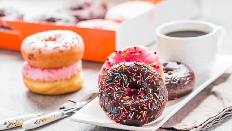 Fast food breakfast with donut and coffee