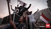 FOTO: Riuh Pendukung Jokowi Rayakan 'Kemenangan' Para pendukung capres-cawapres nomor urut 01 Jokowi dan Ma'ruf Amin merayakan 'kemenangan' hasil quick count pada Rabu (17/4) petang.