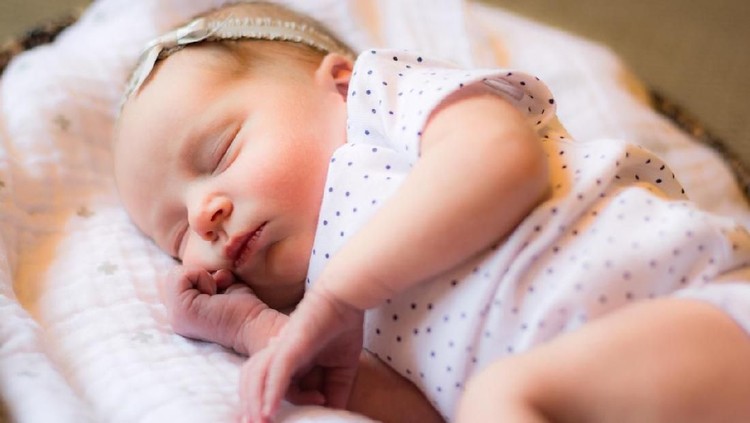 nama bayi 2-day old baby girl infant in basket