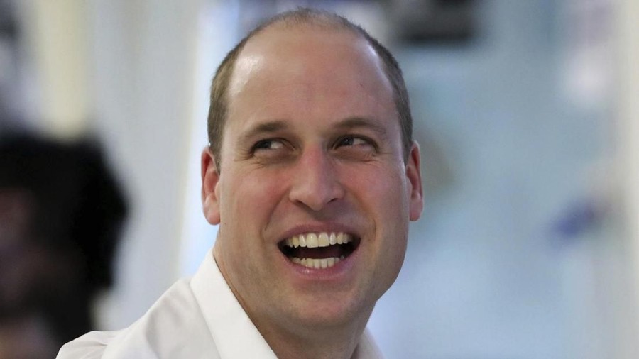Britain Royal Baby Line of Succession FILE - In this Wednesday, Jan. 10, 2018 file photo, Britain's Prince William, Duke of Cambridge, speaks to a patient during his visit to the Royal Marsden NHS Foundation Trust in London, to see the Trust's facilities and view pioneering robotic surgeries. The birth of a royal baby boy to Prince Harry and his wife Meghan, the Duchess of Sussex, has changed the line of succession with the baby becoming seventh in line of succession to the throne. (Daniel Leal-Olivas, Pool Photo via AP, File)