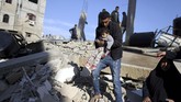FOTO: Saling Serang Israel-Hamas Jelang Ramadan Israel dan Hamas di sebagai penguasa Jalur Gaza masih terus saling serang menjelang hari pertama bulan Ramadan, sebelum keduanya menyepakati gencatan senjata.