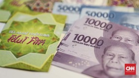Survei: Masyarakat Pilih Bagi-bagi THR dengan Uang Digital