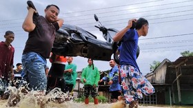 Cuaca Ekstrem, Pahami Batas Ketinggian Banjir yang Aman Buat Skutik