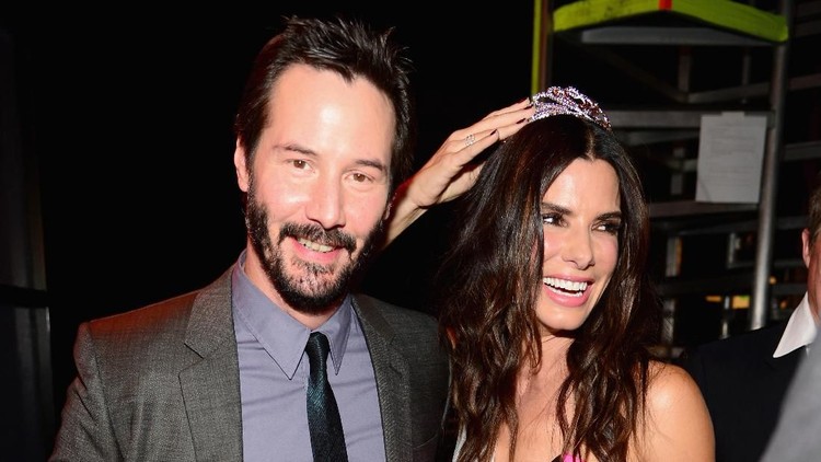 CULVER CITY, CA - JUNE 07:  Actors Keanu Reeves (L) and  Sandra Bullock speak onstage at Spike TV's 
