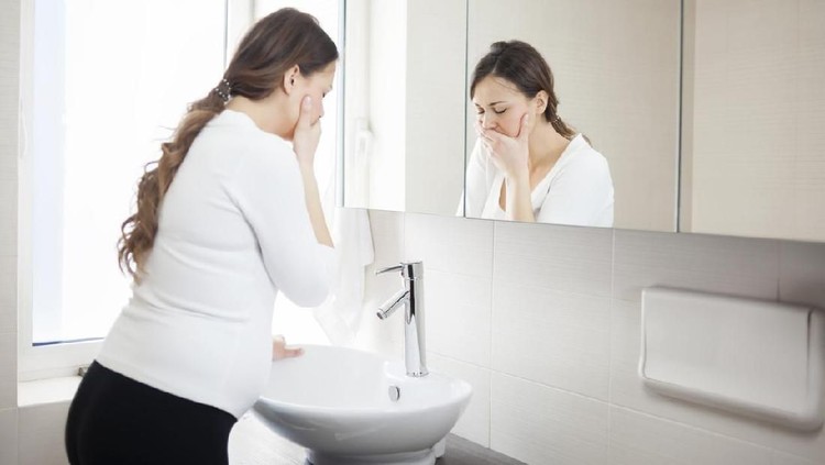 639375806 Young Pregnant Woman Suffering With Morning Sickness In Bathroom