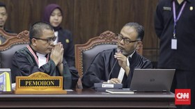 Sidang Perselisihan Hasil Pemilihan Umum (PHPU) Presiden dan Wakil Presiden 2019 di Gedung Mahkamah Konstitusi, Jakarta, Kamis (27/6/2019). Sidang tersebut beragendakan pembacaan putusan oleh majelis hakim MK. (CNN Indonesia/Adhi Wicaksono)