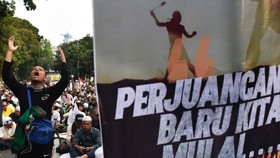 FOTO: Aksi Massa Kawal Sidang Putusan Sengketa Pilpres di MK