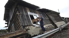 FOTO: Banjir Bandang Menerjang Siberia