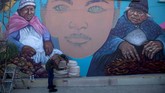 FOTO : Mural Cantik Penghias Desa di 'Atap' Bolivia Desa Chua Uma dekat La Paz di Bolivia bukan perkampungan biasa. Di desa berlokasi 3.800 meter di atas permukaan laut ini memiliki ragam rupa mural cantik.