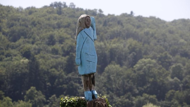 In this Friday, July 5, 2019 photo, a sculpture created by American artist Brad Downey depicting Melania Trump is seen in her hometown in Sevnica, Slovenia. A life-size sculpture of the U.S. first lady has been unveiled in her hometown of Sevnica, drawing mixed reactions from the locals. (AP Photo/Miro Majcen)
