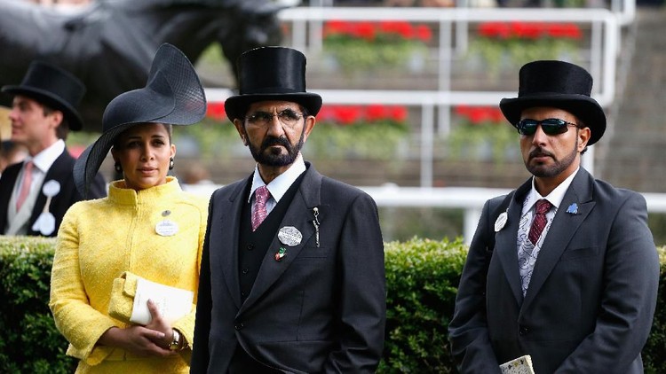 ASCOT, ENGLAND - JUNE 20:  Queen Elizabeth II being congratulated by Sheikh Mohammed bin Rashid Al Maktoum on Ladies' Day during day three of Royal Ascot at Ascot Racecourse on June 20, 2013 in Ascot, England.  (Photo by Charlie Crowhurst/Getty Images for Ascot Racecourse)