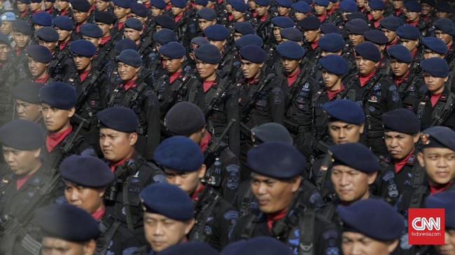 Upacara puncak perayaan HUT ke-73 Bhayangkara di Silang Monas, Jakarta, Rabu. 10 Juli 2019. Presiden mengapresiasi atas pencapaian Wajar Tanpa Pengecualian (WTP) dari BPK serta berharap sinergitas TNI - Polri dapat ditingkatkan dalam upaya menghadapi berbagai tantangan tugas yang semakin kompleks. CNN Indonesia/Adhi Wicaksono