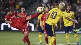 FOTO: Arsenal Kalahkan Munchen Lewat Gol Telat