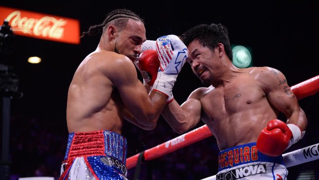 Manny Pacquiao mencatat rekor usai mengalahkan Keith Thurman lewat kemenangan angka atau split decision dalam perebutan gelar WBF Super kelas welter.