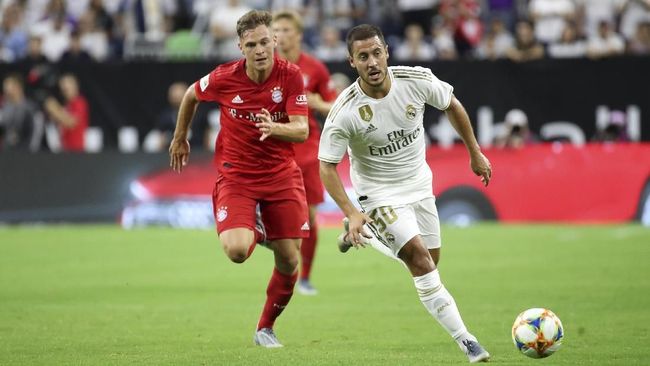 Eden Hazard menandai debut di Real Madrid dengan nomor punggung 50 dan berujung kekalahan 1-3 dari Bayern Munchen di International Champions Cup, Minggu (21/7).