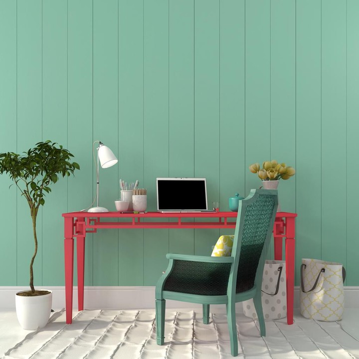 Desain ruang kerja berikut sangat manis. Warna merah menambah suasana jadi lebih cerah ceria. (Foto: iStock)