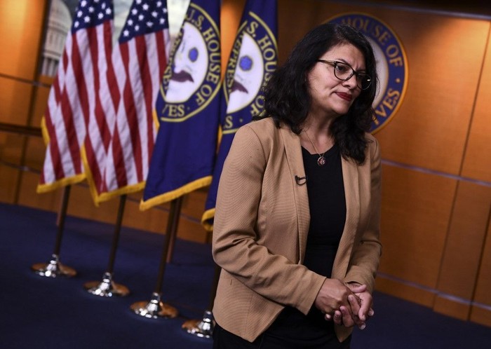WASHINGTON, DC - JULY 15: U.S. Rep. Ilhan Omar (D-MN) speaks as Reps. Ayanna Pressley (D-MA), Alexandria Ocasio-Cortez (D-NY), and Rashida Tlaib (D-MI) listen during a press conference at the U.S. Capitol on July 15, 2019 in Washington, DC. President Donald Trump stepped up his attacks on four progressive Democratic congresswomen, saying if they're not happy in the United States 