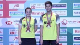 FOTO: Podium Wakil Indonesia di Final Japan Open 2019 Empat wakil Indonesia naik podium di Japan Open 2019, namun hanya Kevin Sanjaya Sukamuljo/Marcus Fernaldi Gideon yang berstatus sebagai juara.