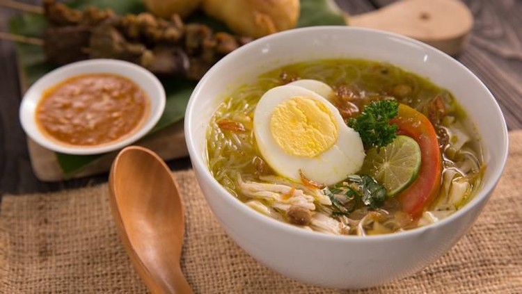soto ayam. shreedded chicken soup with egg. indonesian food