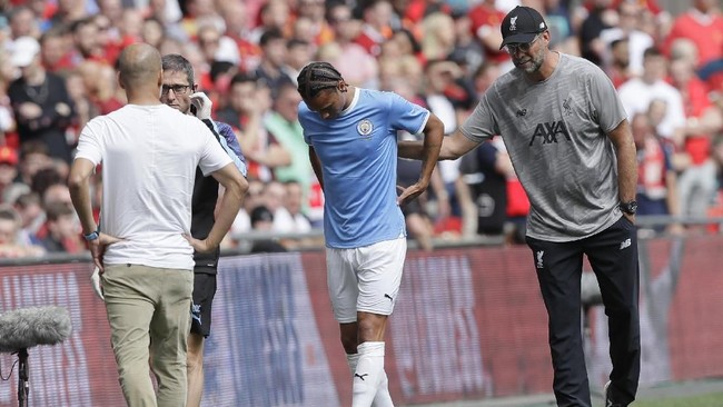Juergen Klopp dan Pep Guardiola melancarkan perang urat saraf jelang laga Liverpool vs Manchester City di Stadion Anfield.