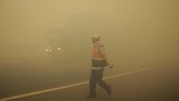 FOTO : Kabut Asap Karhutla Ancam Kesehatan Warga Sebagian wilayah di Sumatera berselimut kabut asap karena kebakaran hutan dan lahan (karhutla). Kabut asap juga mulai mengganggu kesehatan warga.