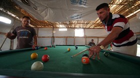 FOTO: Terpikat Kehidupan di Kamp Pengungsian Mosul