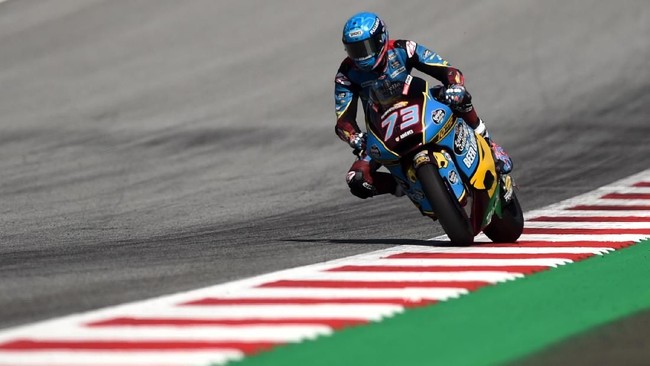 Pebalap Marc VDS, Alex Marquez, berhasil mengunci gelar juara dunia Moto2 usai finis kedua di GP Malaysia, Minggu (3/11).