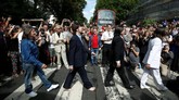 NYALANG: Pencandu Sajak Masa Silam Ada peringatan 50 tahun foto legendaris Beatles di Abbey Road hingga keriaan gadis Afghanistan merayakan Iduladha dalam foto pilihan CNNIndonesia.com pekan ini.