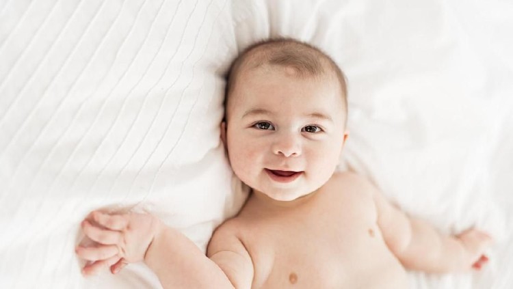Ilustrasi bayi laki-laki A Portrait of a baby boy on the bed in bedroom