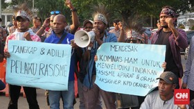 Jokowi Didesak Pecat Aparat Rasialis ke Orang Papua