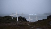 FOTO: Miliaran Ton Es di Greeland Meleleh Mencairnya es di Greenland membuktikan bumi telah terpapar polusi yang parah.