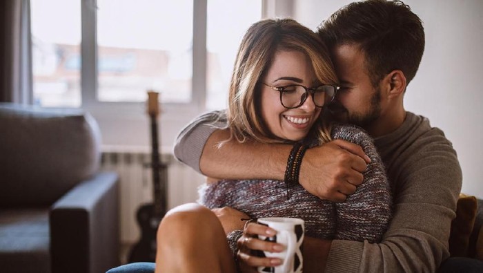 Affectionate Young Couple Enjoying Each Other On Leisure Day At Home