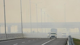 Asap Karhutla Tutupi Jalan Tol Palindra Sumsel dan Pemukiman