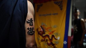 FOTO: Protes Hong Kong Lewat Gurat Tinta Tato