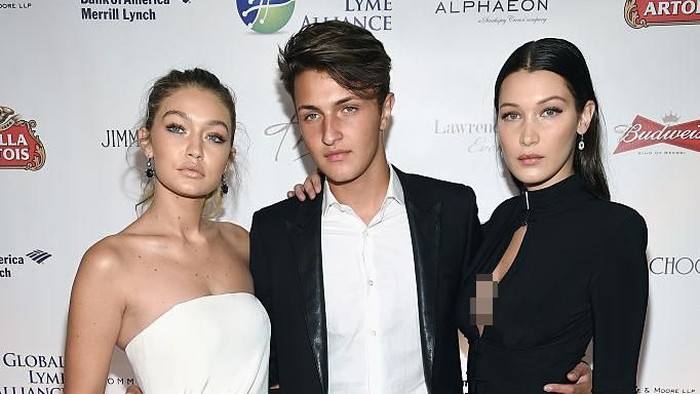 NEW YORK, NY - OCTOBER 08:  (L-R) Gigi Hadid, Anwar Hadid and Bella Hadid attend the Global Lyme Alliance 