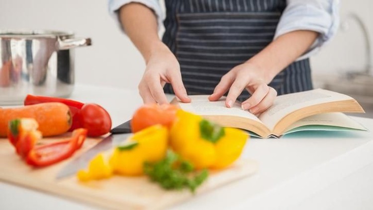 Woman using oven in domestic kitchenPlease see some similar pictures from my portfolio: