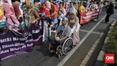FOTO: Pawai Penyandang Disabilitas Serukan Tolak Diskriminasi Para penyandang disabilitas menggelar pawai dari Monas menuju Bundaran HI, Jakarta, menyuarakan penghapusan syarat sehat jasmani dalam rekrutmen tenaga kerja.