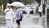 FOTO: Hujan Lebat Berujung Banjir dan Longsor di Jepang Hujan lebat memicu banjir besar dan tanah longsor di sebagian wilayah Jepang.