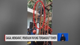 VIDEO: Gagal Mendarat, Penerjun Payung Tersangkut Tower