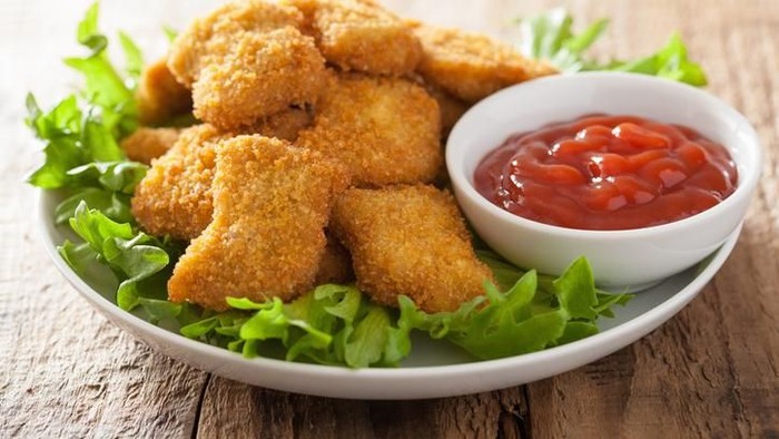 Making oven baked corn flake crumbs chicken nuggets. Series.