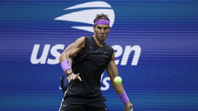 Rafael Nadal menjuarai US Open 2019 usai menundukkan Daniil Medvedev 7-5, 6-3, 5-7, 4-6, dan 6-4 dalam laga final di Stadion Arthur Ashe, Senin (9/9) pagi WIB.